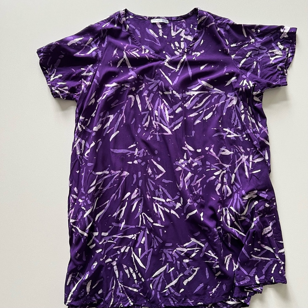 Purple tunic with white accent and softened v-neck